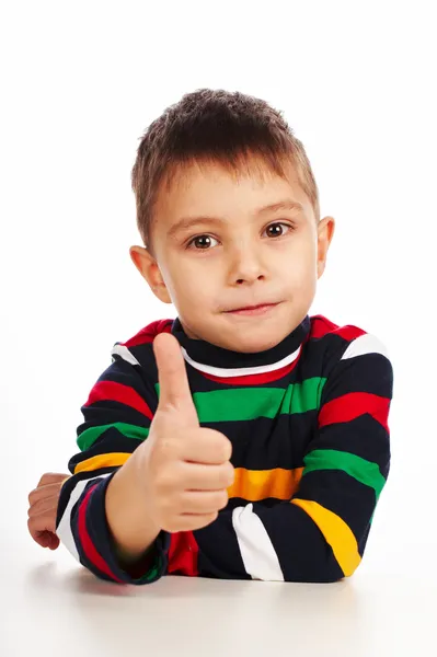 Glimlachend klein kind met duimen omhoog teken — Stockfoto