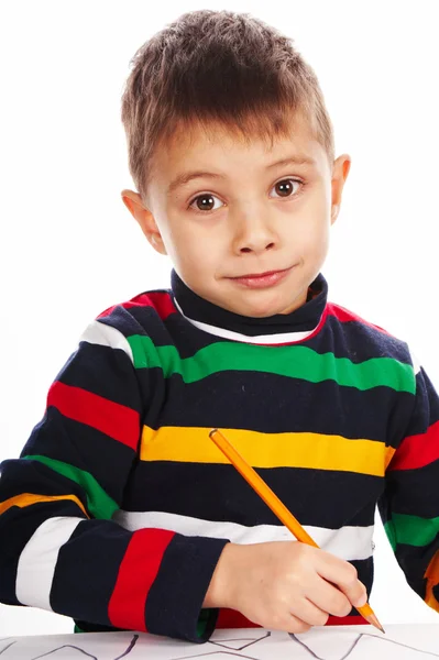 Boy draws a pencil on the album — Stock Photo, Image