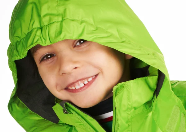 Nevető fiú öltözött egy meleg téli kabát — Stock Fotó