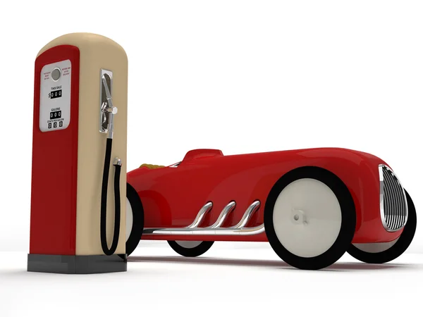 Ретро игрушечный автомобиль и заправка — стоковое фото