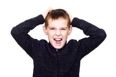 Close-up portrait of boy shouting madly with his hands over his clipart
