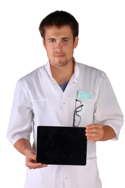 Friendly doctor smiles and hold pad in front of him — Stock Photo, Image