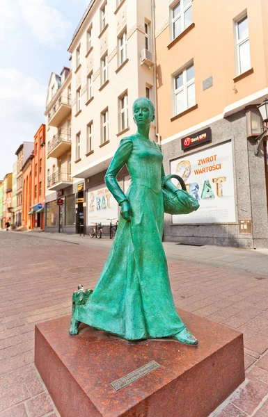 Socha žena Baker (piernikarka) v torun, Polsko — Stock fotografie