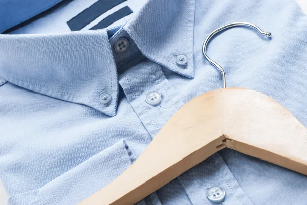 Shirt and cloth hanger — Stock Photo, Image