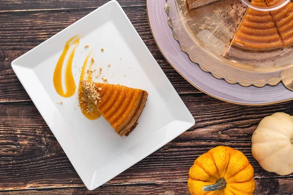 Delicious Pumpkin Cheesecake White Plate Wooden Table — Stock Photo, Image