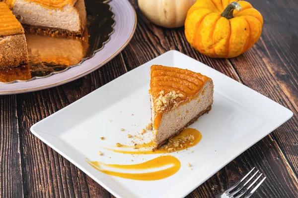 Delicious Pumpkin Cheesecake White Plate Wooden Table — Stock Photo, Image