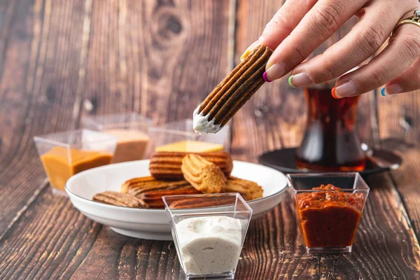 Churros Curry Olives Tomato Paste Wooden Table Turkish Tea — стоковое фото