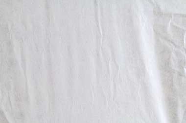 Buruşuk beyaz kağıdın en üst görüntüsü. Beyaz ve buruşuk doku arkaplanı.