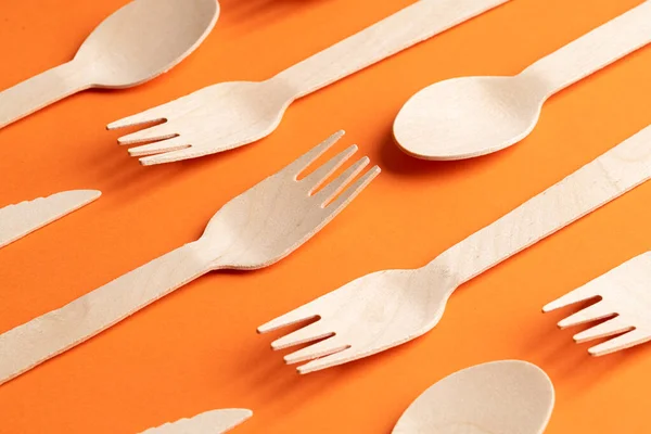 Disposable Wooden Cutlery Orange Background Environmentally Friendly Materials — Stock Photo, Image