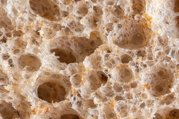 Buğday unundan pişirilmiş kahverengi ekmek dokusu. Yüksek çözünürlüklü kahverengi ekmek dokusu arka planı.