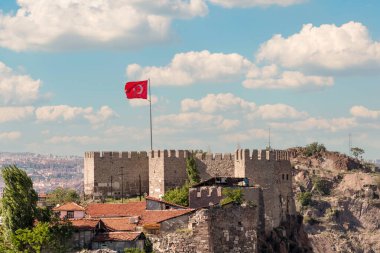 Ankara Castle with the Turkish flag flying over it. Turkish name is Ankara Kalesi