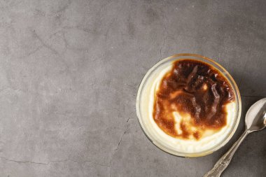 Traditional turkish dessert bakery rice pudding Turkish name Firin Sutlac in glass bowl