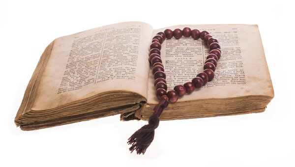 Open Bible and rosary