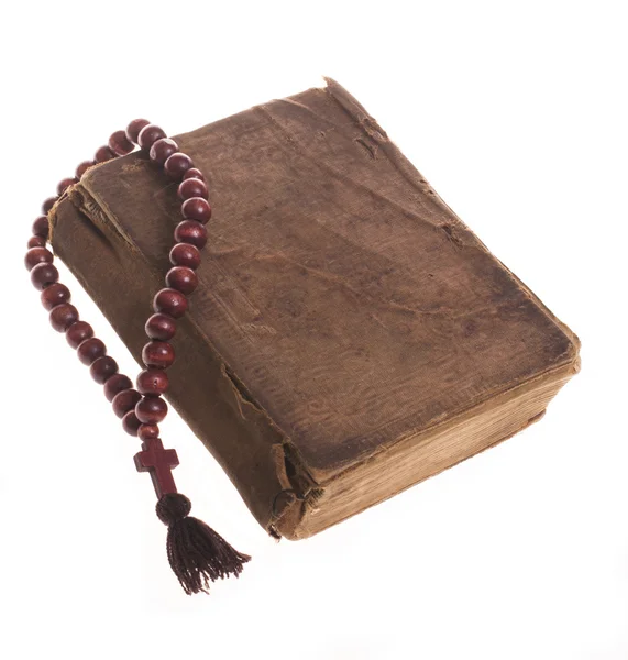 Biblia antigua y rosario Imagen de archivo