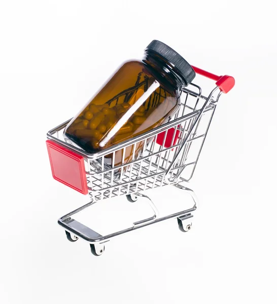 The product cart with a jar with capsules — Stock Photo, Image