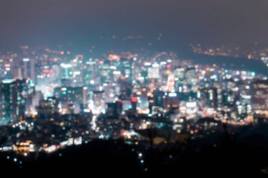 Seul, Güney Kore 'nin bulanık şehir ışıkları.