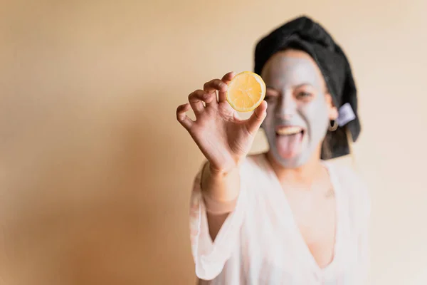 Happy Girl Applying Facial Cleansing Mask While — Stok Foto