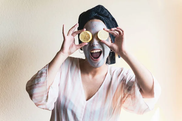 Happy Girl Applying Facial Cleansing Mask While — Stok Foto