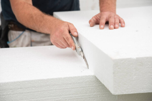 Cutting styrofoam block with exactoknife