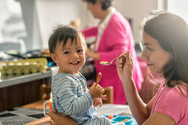 Cute Latin Baby Boy Smiling Having His Breakfast — Stock Photo, Image