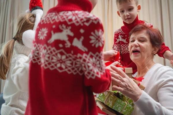 Children Receive Gifts Grandmother — Stock Photo, Image