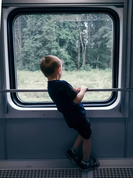 Little Boy Standing Window Train — Stock Photo, Image
