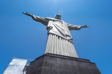 Beautiful view to Christ the Redeemer Statue on a sunny day with blue sky, Rio de Janeiro, Brazil