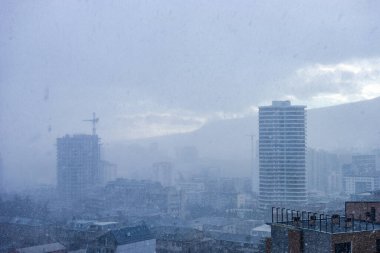 Snow storm with first snow in city centre in Tbilisi, capital of Georgia