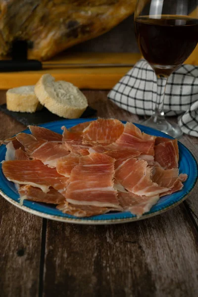 Plate Spanish Acorn Fed Iberian Ham Foreground Bread Wine Typical — Fotografia de Stock