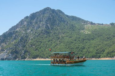 Manavgat, Antalya Province, Turkey 17.07.2021. Boat trip in Green Canyon in Antalya region, Turkey, on a sunny summer day clipart