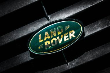 GOZO, MALTA - AUGUST 2, 2015: Land Rover owners from Malta gather for a trip to Gozo on the occasion of International Land Rover Day 2015.  The iconic Defender goes out of production in December 2015. clipart