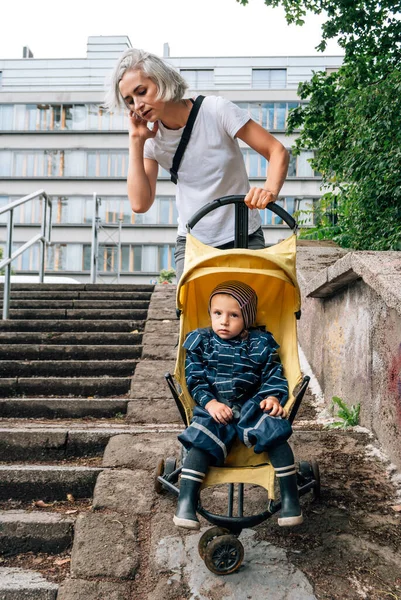 Mother Uses Ramp Roll Stroller Her Young Son — Stock Photo, Image