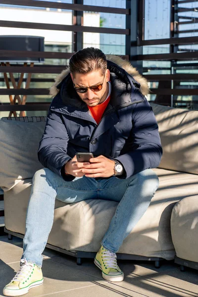 Elegant Young Man Looking His Smartphone — Foto Stock