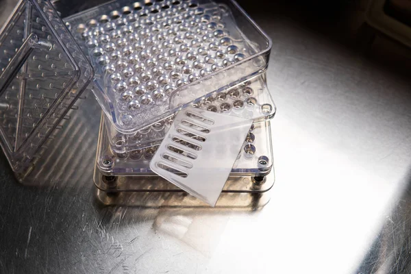 capsule filling machine. Transparent capsules for dietary supplements. Creation of capsular microdoses of courses