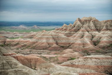 Layered hills show the sedimentation which occured across the plains before eroding to the wonderful formations in Badlands National Park.