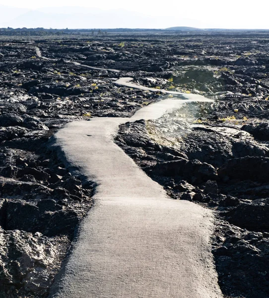 Trail Paved Black Volcanic Rocks Craters Moon — Foto de Stock