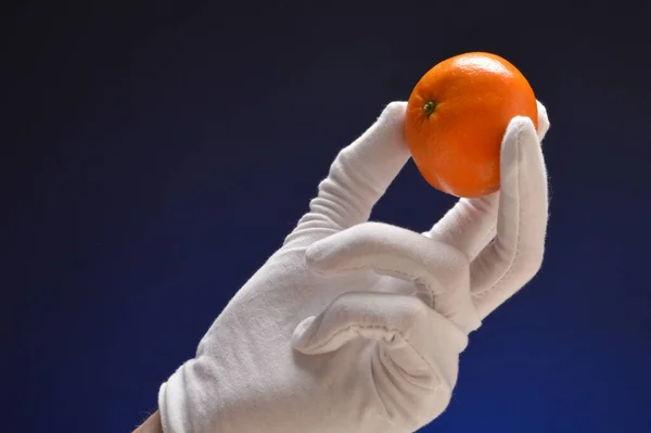 Orange White Gloved Hand — Stock fotografie