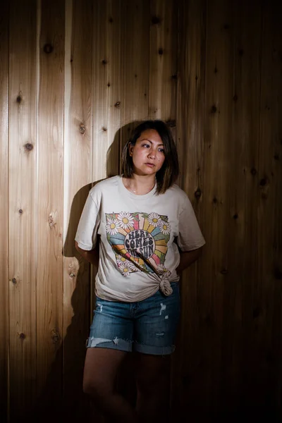 Chinese Woman Modeling Graphic Tee in Studio in San Diego
