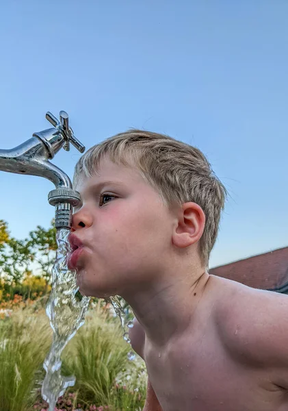 Little Boy Drinks Water Street Tap — Stok fotoğraf