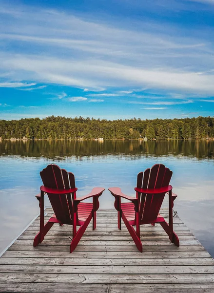 Two Red Adirondack Chairs End Dock Overlooking Lake — Foto de Stock