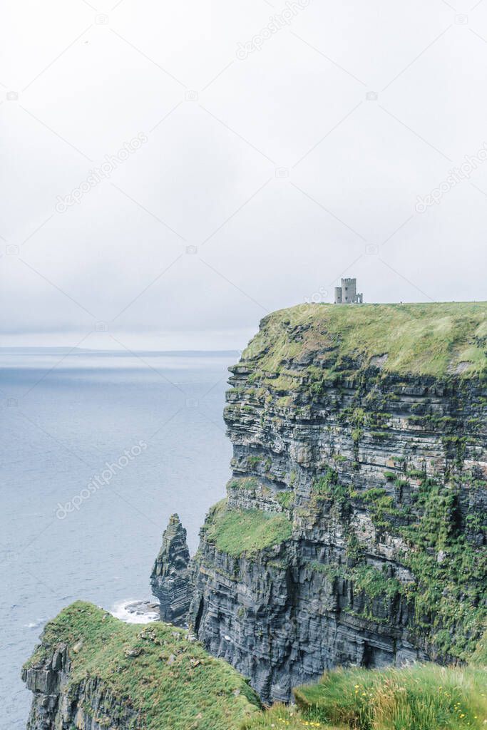 O'Brien Tower at the Cliffs of Moher on a cloudy day
