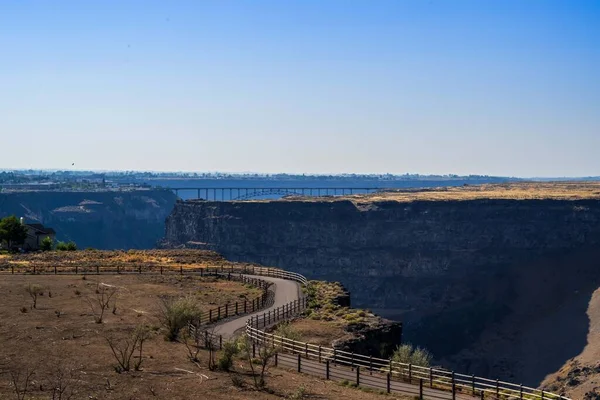 Epic mountain landscape scenery from the walking trail of Shoshone Falls