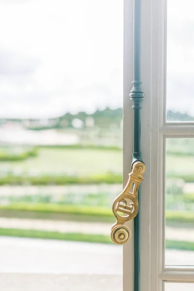 Gold Window Knob Looking Out Lush Gardens Versaille France — стокове фото