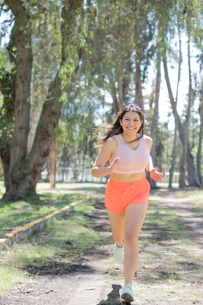 Young Sportswoman Outdoors Doing Various Activities — Zdjęcie stockowe