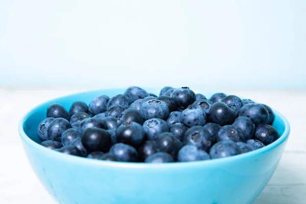 Blueberries Blue Bowl Wooden Table — Stock Photo, Image