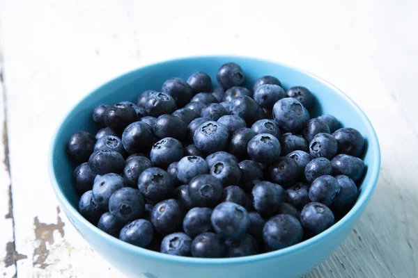 Blueberries Blue Bowl Wooden Table —  Fotos de Stock