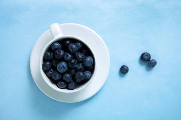 Top View Blueberry Tea Mug Blue Fabric Surface — Foto de Stock