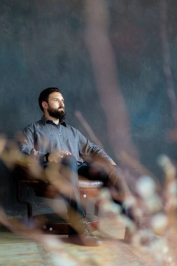 Portrait of an attractive young man with a beard