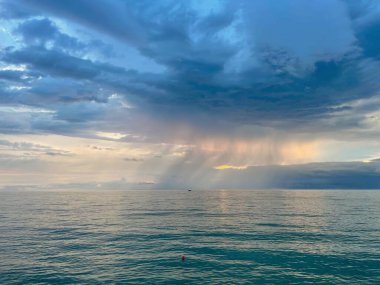 Light pink sunset on the sea