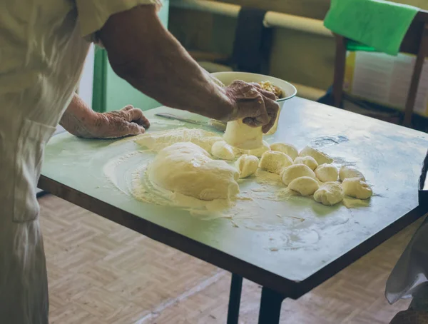 Old Woman Making Dough Balls Patties Flour Kitchen Table — ストック写真